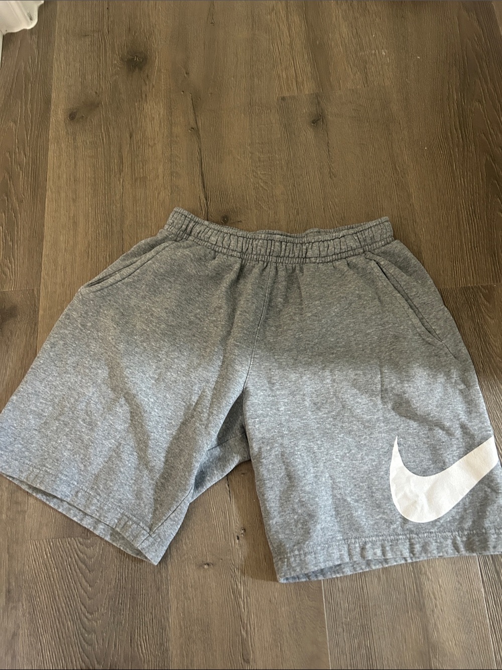 Nike Heather Gray Shorts with White Swoosh Logo